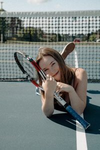 Connie Ragen Green Playing Tennis