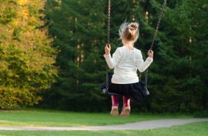 A Sensitive Child on a Swing