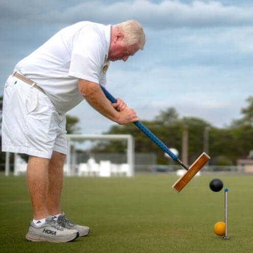 Henri playing croquet